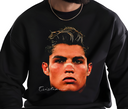 Black sweatshirt with a graphic of a face and 'Cristiano' text on a white background