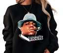 Woman styling black King of Brooklyn crewneck sweatshirt,  oversized East Coast streetwear fit.