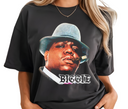 Woman styling black King of Brooklyn t-shirt, casual unisex East Coast streetwear tee.