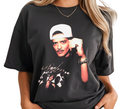 Woman styling black Velvet Showman t-shirt, casual unisex music shirt.