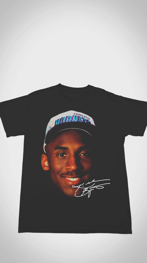 Vintage Kobe Bryant Draft Day T-shirt - Close-up video shows heavyweight 100% cotton, distressed 1996 Charlotte Hornets draft graphics, and authentic '13th Pick' details for hardcore collectors.