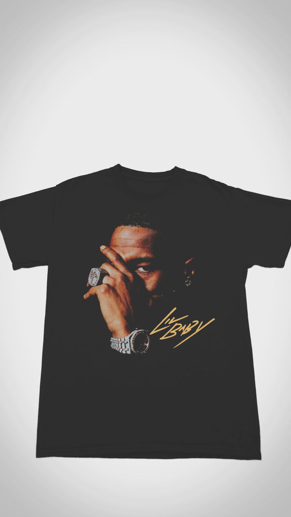 Official Lil Baby 'My Turn' T-shirt - Close-up video shows heavyweight distressed cotton, vibrant tour graphics, and double-stitched seams for authentic trap fashion.