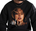 Man wearing black Tate McRae Greedy crewneck, vintage pop fan apparel.